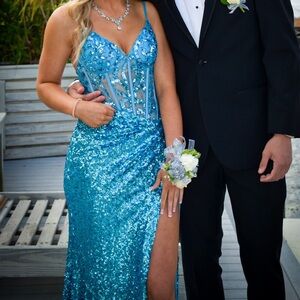 Jasz long dress, fitting top with stretchy bottom. Only worn once for prom.